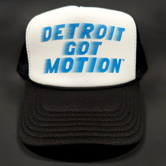 Black and white trucker hat with blue 'Detroit Got Motion' logo