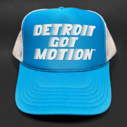 Blue cap with 'Detroit Got Motion' text on a black background