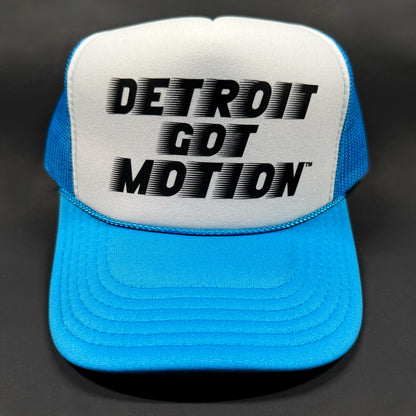 Blue and white cap with black 'Detroit Got Motion' logo